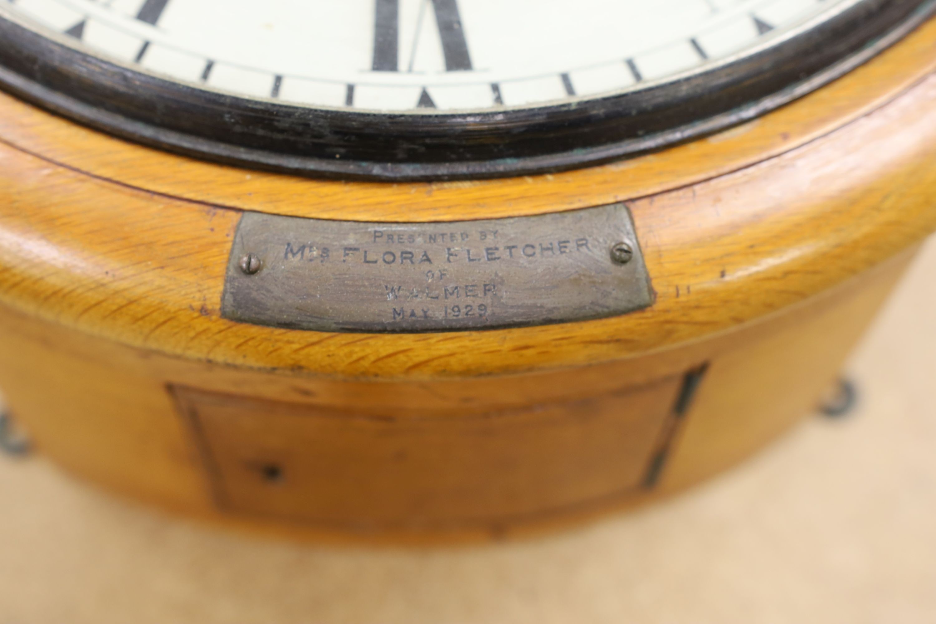A Victorian oak-cased dial clock, signed JW Benson, London, 38 cms diameter.